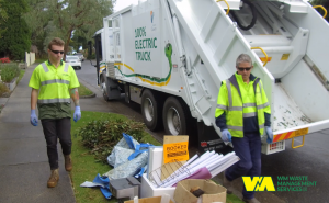 WM Waste workers collecting hard waste 